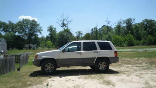 1998 jeep grand cherokee, white 4door,automatic