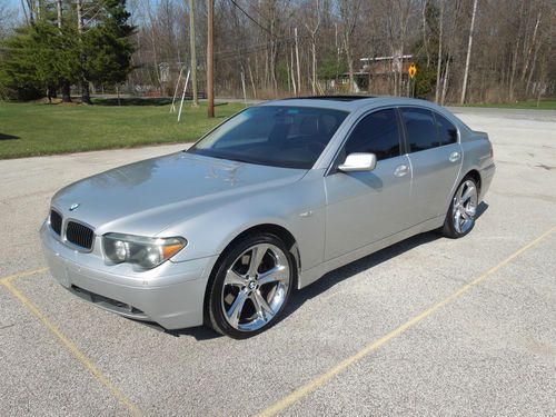 2003 bmw 745i base has rare 21 inch chrome rims. no reserve