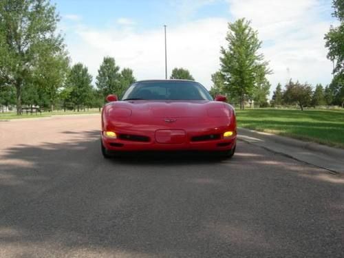 2002 chevrolet corvette excellent condition very pampered ls1 engine  torch red