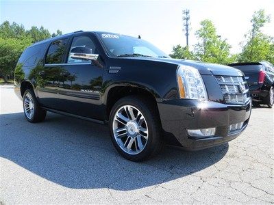 Awd, premium, navigation, sunroof, dvds, special 22" wheels and more!