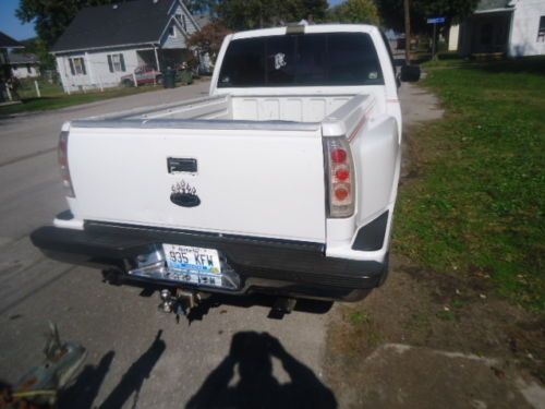 Truck is white 350 motor short bed v/g running condition-8 cylinders