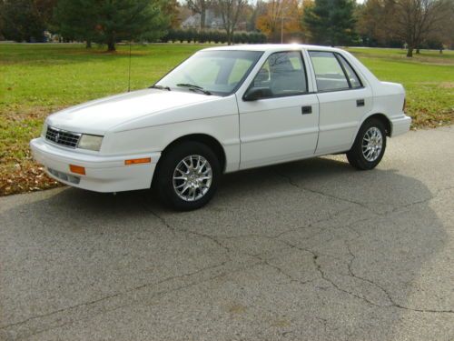 1994 plymouth sundance  garage keep.   32mpg   no reserve ,low miles