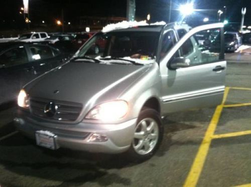2004 mercedes  ml350 with 72,600 miles.  silver exterior and black interior