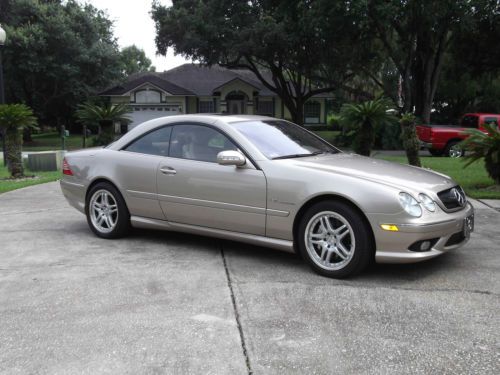2005.mercedes cl55amg, champagne gold,with light tan leather interior