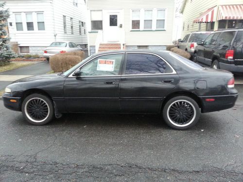 1997 mazda 626 dx sedan 4-door 2.0l