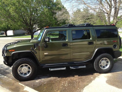 Hummer h2, army green, excellent condition, lots of chrome, bose speakers