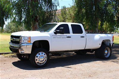 Low miles lifted duramax diesel dual rear wheel 4x4 with fabtech lift 22" wheels