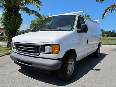 05 cargo van with racks  4.6l engine great on gas runs great low reserve no rust