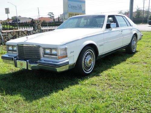 1983 cadillac seville 27,000 actual miles white/blue like new