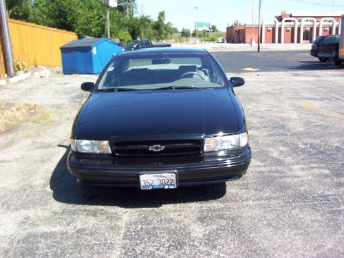 Chevy impala ss 1996 black and grey super low miles only 30000