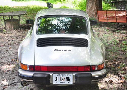 Silver 1987 911 coupe that is upgraded with all the dream options and features