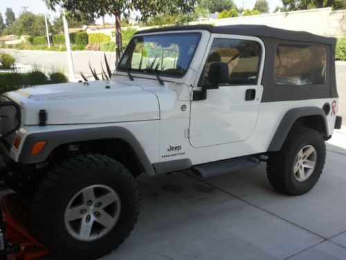 2005 jeep wrangler unlimited 4.0l/6spd a/c tint soft top 72k mi $8,200 in extras