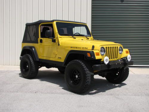 Solar yellow tj rubicon-6 speed manual-lifted-bfg tires-low miles-new top!