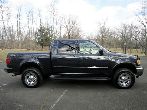 2001 ford f-150 xlt lariat with 4x4 and quad cab with no reserve