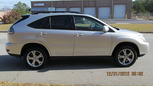 2006 lexus rx 400h suv silver/black, 106,400 mil. 3.3l v6 hybrid gas engine.