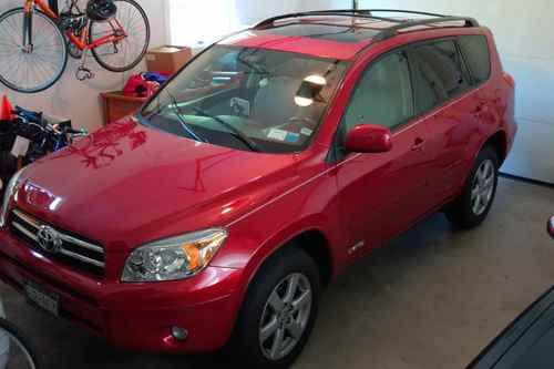 2008 toyota red rav4 limited sport utility 4-door 2.4l with racing stripe