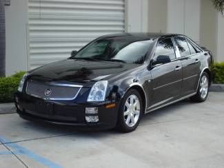 2005 cadillac sts loaded navigation leather chrome garage kept well maintained!