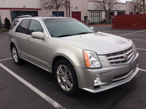 2008 cadillac srx awd sport, 7 passenger, panoramic roof, navi, dvd, tow pkg