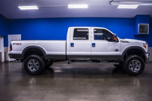 Low miles 6.7l powerstroke diesel lifted crew cab nerf bars bed liner pwr locks