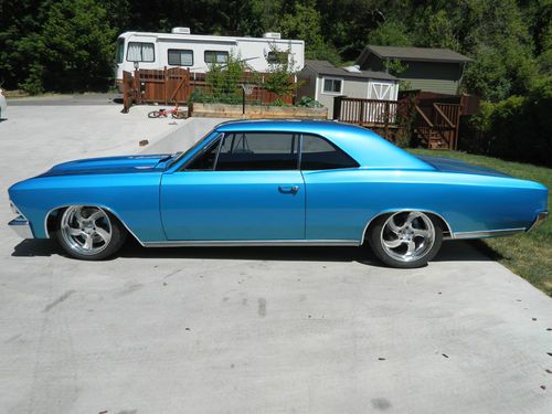 1966 chevelle ls1, 6 speed, a/c, coil over. frame off, pro touring.  1 of a kind