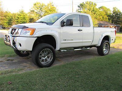 2008 nissan titan xcab se 4x4 show dog.jacked up!.34000 actual 1 owner miles.wow
