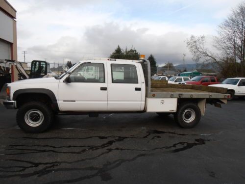 Surplus lifted 1999 1ton crew cab 4x4 flatbed work truck