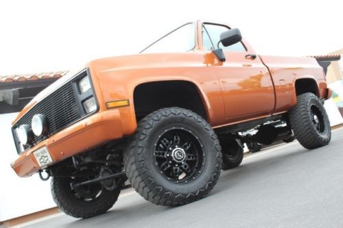 87 chevy k10 4wd auto. 5.7l injected. 35 in tires. lifted and more. gorgeous.