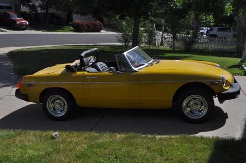 1978 mgb with less than 74k miles, yellow with tan top - runs great