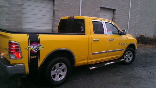 2009 dodge ram 1500 slt quad cab pickup 4-door 4.7l (make an offer..must sell)