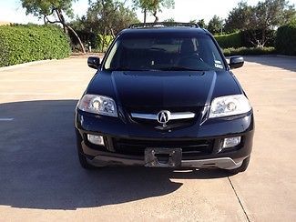 2006 acura mdx touring black,clean carfax,3rd row,heated seats,roof,very clean