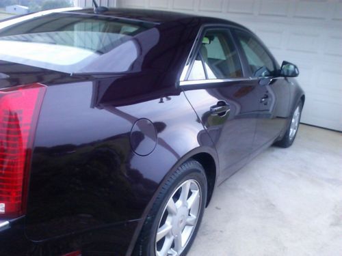 Reduced!!plum, excellent condition, 4 door garage kept beautiful car!
