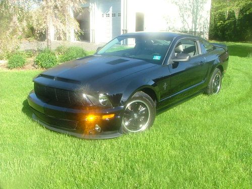 2007 ford mustang w/ gt500 front end,v6 auto, black w/ gray leather interior