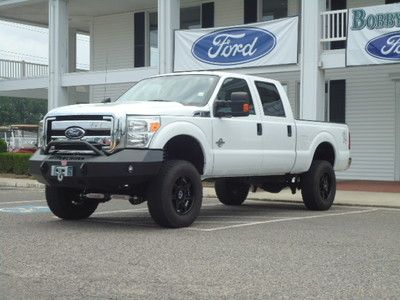 F250 xlt crewcab white grey cloth  lifted one owner carfax certified we finance