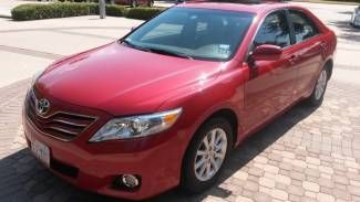 2011toyota camry  xle v6  red/ash leather42kmi,nav,heated seats,sunroof leather.