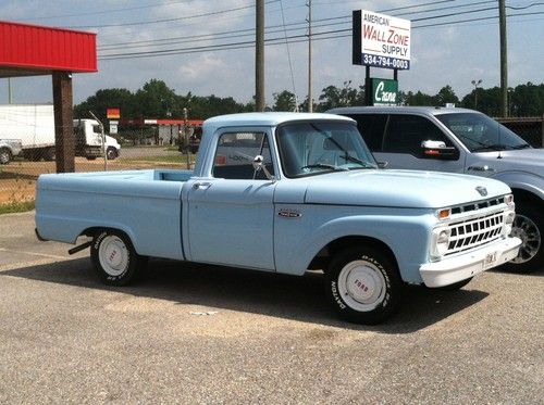 1965 ford f-100 truck with 6 cylinder engine and on the column manual shift