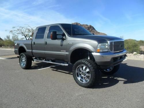 2003 ford f250 crew cab fx4 4x4 shortbed diesel lifted