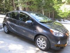 2012 toyota prius c three, gray, only 5,323 miles.