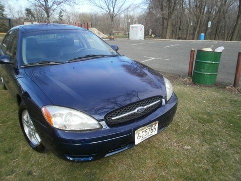 2001 ford taurus  6cyl.- 4d  only 79,800 blue