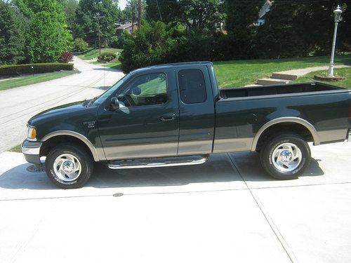 2001 ford f-150 xlt extended cab, 4wd, dark green/ beige, nice truck!