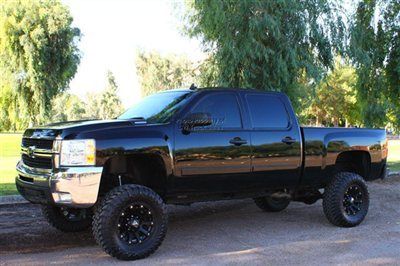 Lifted 1 owner duramax diesel 4x4 new toyo tires xd wheels bds lift  we finance