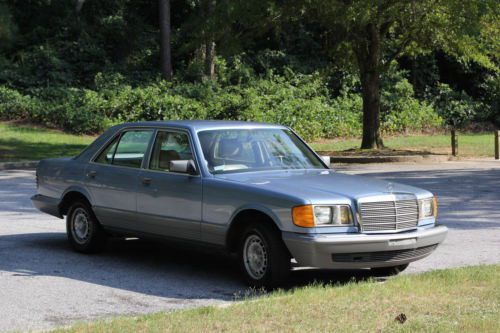 1985-300sd mercedes automatic trans, sky blue, cream interior