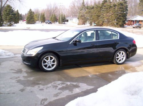 G35 - black with grey leather.  excellent condition in and out.