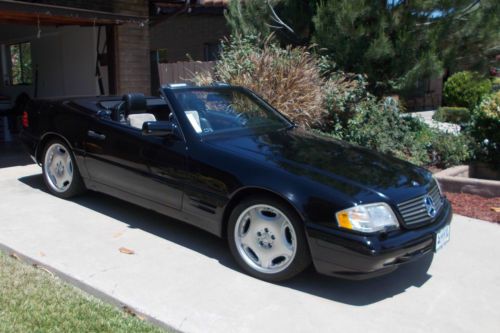 1997 blk paint, blk leather int, low mileage, mint condition, garage stored