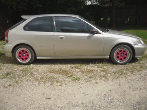 96 honda civic 2dr. coupe custom, 5spd., 94kmi. 00 front end. wheels alloy