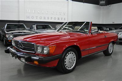 Exceptional service history exceptional 560sl with red and creme