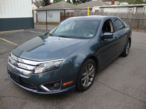 2011 ford fusion sel sedan ; 2.5l i-4; new tires; low miles &amp; low reserve!!