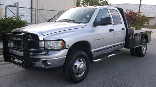 2005 dodge ram 3500 h.o. auto 4x4 dually flat bed crew air suspension  one owner