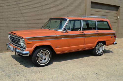 1977 jeep wagoneer, survivor. orange with original plaid interior. 86,000 miles.