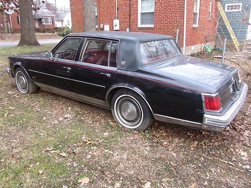 1976 cadillac seville sedan 4-door v8 - black/burgundy int