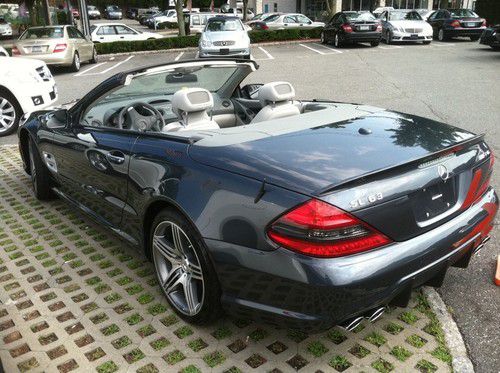2011 sl63 amg  immaculate condition.  non-smoker. panoramic convertible 7500 mi